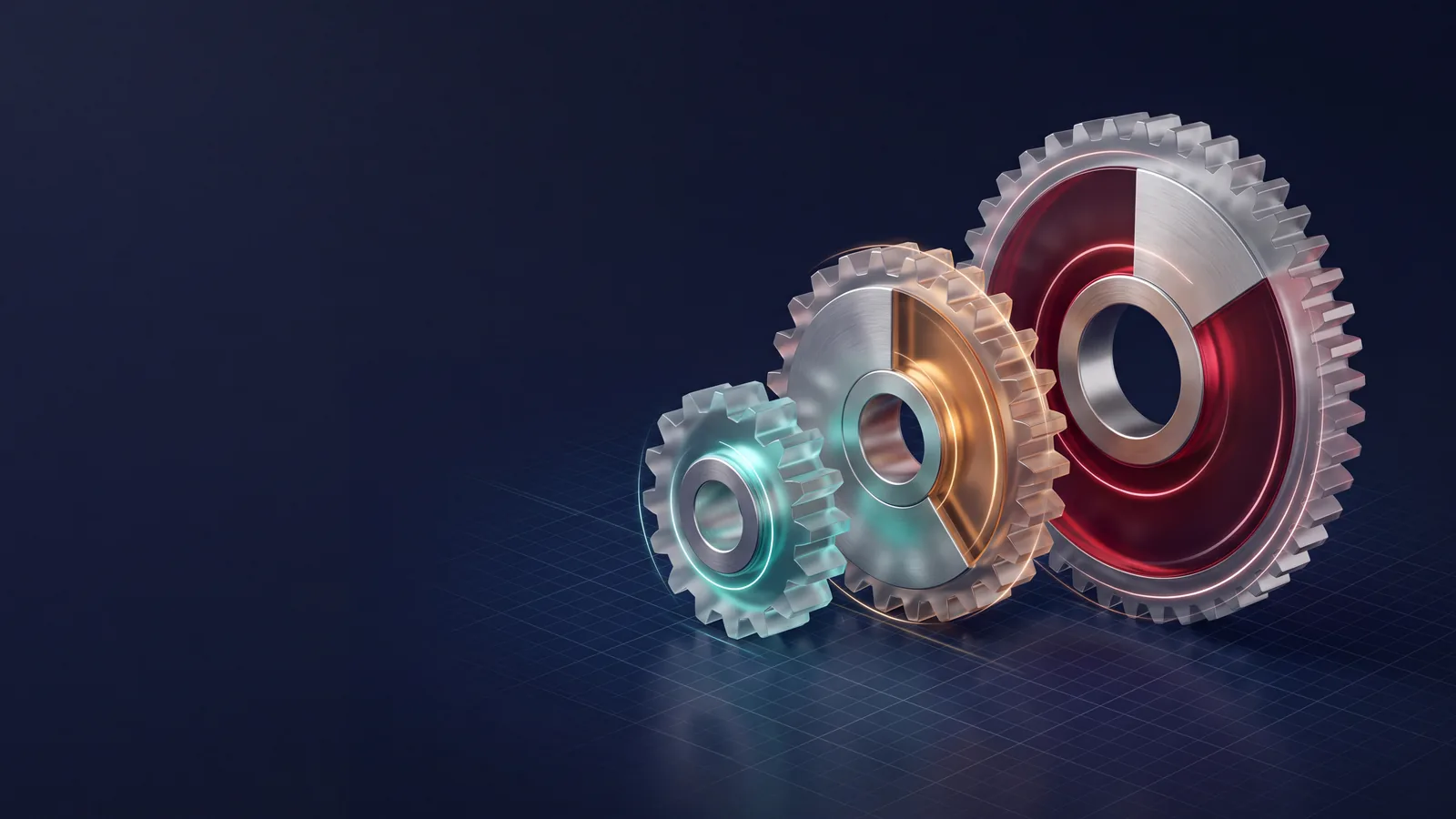 Three interlocking glass and brushed metal gears in teal, amber and deep red meshing on a dark navy surface over a faint blueprint grid